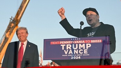 Tesla CEO Elon Musk (R) speaks on stage as he joins former US President and Republican presidential candidate Donald Trump during a campaign rally at site of his first assassination attempt in Butler, Pennsylvania on October 5, 2024. (AFP) Tesla CEO Elon Musk (R) speaks on stage as he joins former US President and Republican presidential candidate Donald Trump during a campaign rally at site of his first assassination attempt in Butler, Pennsylvania on October 5, 2024. (AFP)