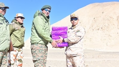 Indian, Chinese troops exchanging sweets on Diwali at the LAC. Indian, Chinese troops exchanging sweets on Diwali at the LAC.