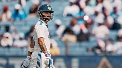 Pune: India's Virat Kohli walks back to pavilion after his dismissal on the third day of the second test match. (PTI) Pune: India's Virat Kohli walks back to pavilion after his dismissal on the third day of the second test match. (PTI)