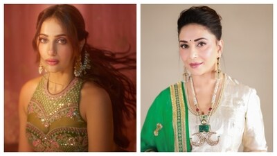 Kusha Kapila and Madhuri Dixit are decked up in ethnic looks. Kusha Kapila and Madhuri Dixit are decked up in ethnic looks.