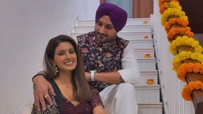 Harbhajan Singh and Geeta Basra in colour-co-ordinated outfits for Diwali. Harbhajan Singh and Geeta Basra in colour-co-ordinated outfits for Diwali.