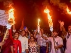Junior doctors raise slogans during a torch rally towards the CBI office in protest against the alleged rape and murder of a woman medic at the RG Kar Medical College and Hospital, in Kolkata on Oct. 30, 2024. 