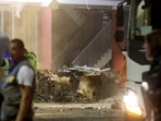 A bicycle sits between rubbles at the scene where the roof of a train station collapsed, killing several people in Serbia
