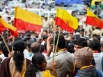 Commercial establishments across Bengaluru have installed a flag in front of their shops to celebrate Kannada Rajyotsava Day. Commercial establishments across Bengaluru have installed a flag in front of their shops to celebrate Kannada Rajyotsava Day.