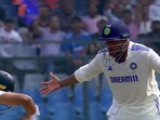 Sarfaraz Khan with a send-off to Rachin Ravindra. Sarfaraz Khan with a send-off to Rachin Ravindra.
