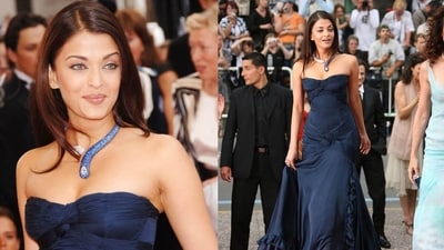Aishwarya Rai dazzled at Cannes 2006 in an Elie Saab blue gown. Her off-shoulder ensemble was beautifully accessorised with a shimmering silver and blue snake necklace that stole the spotlight. (Instagram) Aishwarya Rai dazzled at Cannes 2006 in an Elie Saab blue gown. Her off-shoulder ensemble was beautifully accessorised with a shimmering silver and blue snake necklace that stole the spotlight. (Instagram)