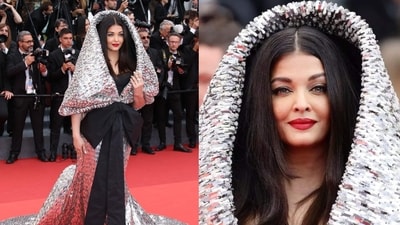 Aishwarya rocked a stunning Sophie Couture gown at Cannes 2023. The extravagant silver hood, combined with a floor-sweeping hemline and a large bow at the waist, created a look that exuded high-fashion allure. (Instagram) Aishwarya rocked a stunning Sophie Couture gown at Cannes 2023. The extravagant silver hood, combined with a floor-sweeping hemline and a large bow at the waist, created a look that exuded high-fashion allure. (Instagram)