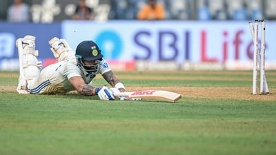 India's Virat Kohli is being run out by New Zealand's Matt Henry. (Photo by INDRANIL MUKHERJEE / AFP) (AFP) India's Virat Kohli is being run out by New Zealand's Matt Henry. (Photo by INDRANIL MUKHERJEE / AFP) (AFP)