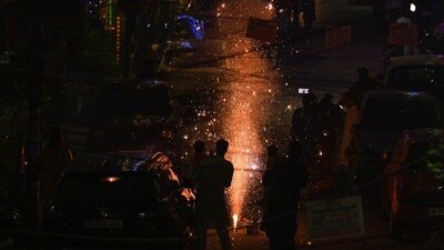 People burst crackers on the occasion of Diwali at Pandav Nagar in New Delhi on October 31. The city's air quality dropped to the "very poor" category, with an Air Quality Index (AQI) of 330 at 10 pm. (Ajay Aggarwal/ Hindustan Times) People burst crackers on the occasion of Diwali at Pandav Nagar in New Delhi on October 31. The city's air quality dropped to the "very poor" category, with an Air Quality Index (AQI) of 330 at 10 pm. (Ajay Aggarwal/ Hindustan Times)