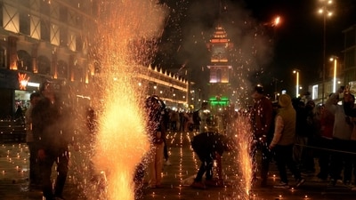 People burst firecrackers during the Diwali festival celebrations at Lal Chowk, in Srinagar on Thursday. According to Drik Panchang, Diwali as well as Chhoti Diwali fell on the same day this year. (PTI) People burst firecrackers during the Diwali festival celebrations at Lal Chowk, in Srinagar on Thursday. According to Drik Panchang, Diwali as well as Chhoti Diwali fell on the same day this year. (PTI)