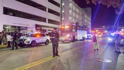 Police investigate the scene of two shootings that took place among crowds during Halloween celebrations early Friday, Nov. 1. 2024 in Orlando, Fla. (WFTV via AP) (AP) Police investigate the scene of two shootings that took place among crowds during Halloween celebrations early Friday, Nov. 1. 2024 in Orlando, Fla. (WFTV via AP) (AP)