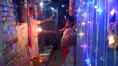 People light firecrackers during the celebrations to mark Diwali, the Hindu festival of lights, in New Delhi, where fire crackers were banned. (AFP) People light firecrackers during the celebrations to mark Diwali, the Hindu festival of lights, in New Delhi, where fire crackers were banned. (AFP)