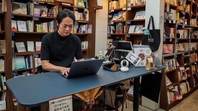 Tokyo's shelf-sharing bookstores, like Imamura's Honmaru, provide a platform for diverse book selections driven by passionate owners. (Photo by Kazuhiro NOGI / AFP) Tokyo's shelf-sharing bookstores, like Imamura's Honmaru, provide a platform for diverse book selections driven by passionate owners. (Photo by Kazuhiro NOGI / AFP)