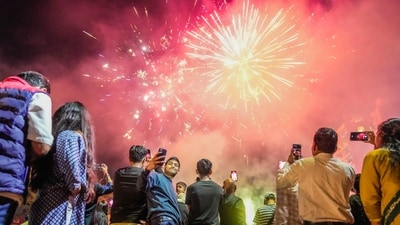 People light firecrackers during Diwali, the festival of lights in Nairobi, Kenya Thursday. (AP) People light firecrackers during Diwali, the festival of lights in Nairobi, Kenya Thursday. (AP)