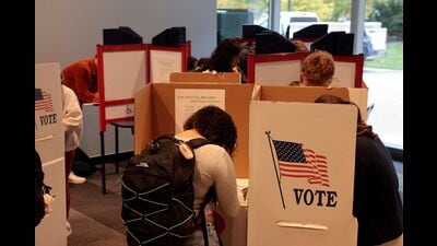 People cast their ballots during early voting for the US general election at the University of Michigan Museum of Art Gallery in Ann Arbor, Michigan on October 31, 2024. (Photo by JEFF KOWALSKY / AFP) (AFP) People cast their ballots during early voting for the US general election at the University of Michigan Museum of Art Gallery in Ann Arbor, Michigan on October 31, 2024. (Photo by JEFF KOWALSKY / AFP) (AFP)