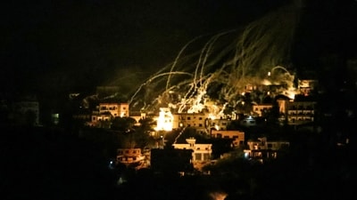 A picture taken from the area of Marjeyoun in southern Lebanon shows explosions over buildings in the town of Khiam, during Israeli bombardment on October 31, 2024, amid the ongoing war between Israel and Hezbollah. (AFP) A picture taken from the area of Marjeyoun in southern Lebanon shows explosions over buildings in the town of Khiam, during Israeli bombardment on October 31, 2024, amid the ongoing war between Israel and Hezbollah. (AFP)