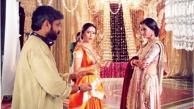 Sanjay Leela Bhansali directing Madhuri Dixit and Aishwarya Rai during a pivotal scene of their 2002 movie, Devdas. Sanjay Leela Bhansali directing Madhuri Dixit and Aishwarya Rai during a pivotal scene of their 2002 movie, Devdas. 