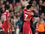 Liverpool's manager Arne Slot, right, celebrates with his player Luis Diaz after defeating Brighton. Liverpool's manager Arne Slot, right, celebrates with his player Luis Diaz after defeating Brighton.