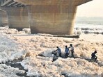 Rescuers on Saturday look for Mohammad Shami, a motorcyclist who was flung into the river after being struck by a car on the Kalindi Kunj Bridge. (Arvind Yadav/HT Photo) Rescuers on Saturday look for Mohammad Shami, a motorcyclist who was flung into the river after being struck by a car on the Kalindi Kunj Bridge. (Arvind Yadav/HT Photo)