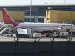 An IndiGo aircraft and an Air India aircraft on the tarmac at Indira Gandhi International Airport in New Delhi. An IndiGo aircraft and an Air India aircraft on the tarmac at Indira Gandhi International Airport in New Delhi.