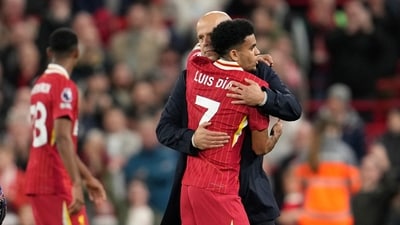 Liverpool's manager Arne Slot, right, celebrates with his player Luis Diaz after defeating Brighton. (AP) Liverpool's manager Arne Slot, right, celebrates with his player Luis Diaz after defeating Brighton. (AP)