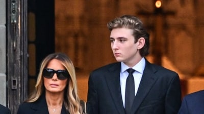 (FILES) Former US President Donald Trump and his son Barron Trump attend the funeral of former first lady Melania Trump's mother Amalija Knavs, (AFP) (FILES) Former US President Donald Trump and his son Barron Trump attend the funeral of former first lady Melania Trump's mother Amalija Knavs, (AFP)