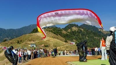 Himachal Pradesh Tourism Chairman RS Bali flagging off the Paragliding World Cup 2024 at Bir in Kangra district. (PTI) Himachal Pradesh Tourism Chairman RS Bali flagging off the Paragliding World Cup 2024 at Bir in Kangra district. (PTI)