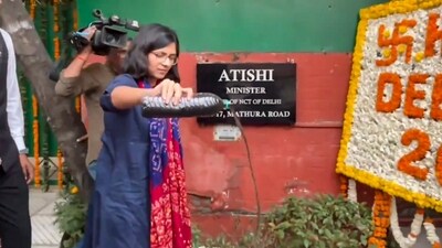 Rajya Sabha MP Swati Maliwal pours dirty water, allegedly brought from the house of an army officer in Dwarka, outside Delhi Chief Minister Atishi's residence, in New Delhi. (PTI) Rajya Sabha MP Swati Maliwal pours dirty water, allegedly brought from the house of an army officer in Dwarka, outside Delhi Chief Minister Atishi's residence, in New Delhi. (PTI)