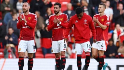 Manchester United players applaud fans after a match. (REUTERS)