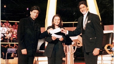Shah Rukh Khan and Rani Mukerji with Amitabh Bachchan on the set of Kaun Banega Crorepati. 