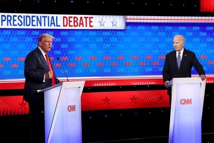 U.S. President Joe Biden (R) and Republican presidential candidate, former U.S. President Donald Trump participate in the CNN Presidential Debate at the CNN Studios on June 27, 2024 in Atlanta, Georgia. (AFP)