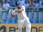 India's captain Rohit Sharma plays a shot during the third day of the third and final Test cricket match between India and New Zealand. (Photo by INDRANIL MUKHERJEE / AFP) / India's captain Rohit Sharma plays a shot during the third day of the third and final Test cricket match between India and New Zealand. (Photo by INDRANIL MUKHERJEE / AFP) /