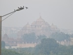 New Delhi, India - Nov. 1, 2024: Smog and pollution at NH24 near Akshardham Temple area after Diwali festival, People burning fire crackers on the occasion of Diwali festival despite of the ban by Delhi Government in New Delhi, India, on Friday, November 1, 2024. (Photo by RAJ K RAJ / Hindustan Times)(RAJ K RAJ /HT PHOTO)