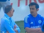 Ajit Agarkar (L) and Gautam Gambhir (C) in a serious chat Ajit Agarkar (L) and Gautam Gambhir (C) in a serious chat