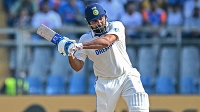 India's captain Rohit Sharma plays a shot during the third day of the third and final Test cricket match between India and New Zealand. (Photo by INDRANIL MUKHERJEE / AFP) / (AFP) India's captain Rohit Sharma plays a shot during the third day of the third and final Test cricket match between India and New Zealand. (Photo by INDRANIL MUKHERJEE / AFP) / (AFP)
