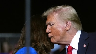 Republican presidential nominee former President Donald Trump kisses a family member as Tammy Nobles, mother of Kayla Hamilton, finishes speaking at a campaign rally at the Salem Civic Center, Saturday, Nov. 2, 2024, in Salem, Va. (AP Photo/Evan Vucci) (AP) Republican presidential nominee former President Donald Trump kisses a family member as Tammy Nobles, mother of Kayla Hamilton, finishes speaking at a campaign rally at the Salem Civic Center, Saturday, Nov. 2, 2024, in Salem, Va. (AP Photo/Evan Vucci) (AP)