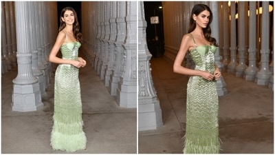 Kaia Gerber brought playful energy to the 2024 LACMA Gala in an intricate green gown, complete with a shimmering design and art deco patterning and feathers on the bottom of the skirt. Kaia Gerber brought playful energy to the 2024 LACMA Gala in an intricate green gown, complete with a shimmering design and art deco patterning and feathers on the bottom of the skirt. 