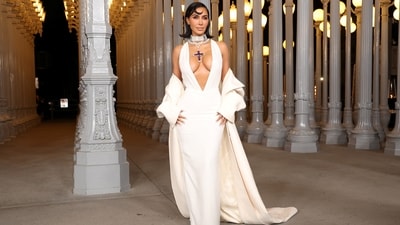 Kim Kardashian attended the 2024 LACMA Art + Film Gala in a plunging white gown styled with a floor-sweeping cape that sat off her shoulders. She styled the ensemble with one of Princess Diana‘s pendants. Known as the Attallah Cross, the antique amethyst piece was famously worn by the late royal at a 1987 charity gala.&nbsp; (REUTERS)