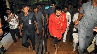 Andhra Pradesh Deputy Chief Minister Pawan Kalyan, who undertook a purification ritual amid the Tirupati laddu controversy, walks to Tirumala temple via the Alipiri stairway, in Tirupati district on Oct 1. (PTI) Andhra Pradesh Deputy Chief Minister Pawan Kalyan, who undertook a purification ritual amid the Tirupati laddu controversy, walks to Tirumala temple via the Alipiri stairway, in Tirupati district on Oct 1. (PTI)