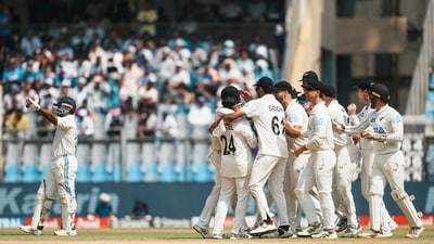 New Zealand's players celebrate the wicket of India's Rishabh Pant during day three of third Test cricket match between India and New Zealand (PTI) New Zealand's players celebrate the wicket of India's Rishabh Pant during day three of third Test cricket match between India and New Zealand (PTI)