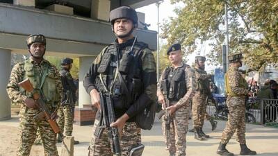 Security personnel cordon off the area after a grenade attack by terrorists, in Srinagar, on Sunday. (PTI) Security personnel cordon off the area after a grenade attack by terrorists, in Srinagar, on Sunday. (PTI)