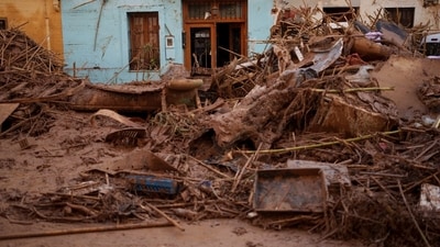 A house covered in mud is pictured in an area affected by floods in Paiporta. (AP) A house covered in mud is pictured in an area affected by floods in Paiporta. (AP)