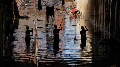 Firefighters search for bodies amongst the debris in the aftermath of deadly floods in the town of Alfafar, in the region of Valencia. (AFP) Firefighters search for bodies amongst the debris in the aftermath of deadly floods in the town of Alfafar, in the region of Valencia. (AFP)