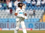New Zealand's Rachin Ravindra walks back to the pavilion. (ANI Photo) New Zealand's Rachin Ravindra walks back to the pavilion. (ANI Photo)