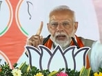 Prime Minister Narendra Modi addresses a public meeting ahead of Jharkhand Assembly elections, in Garhwa district, Jharkhand, Monday.