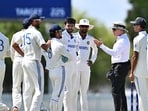 Ishan Kishan and other India A players in conversation with umpire Ishan Kishan and other India A players in conversation with umpire