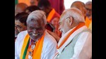 Chaibasa [Jharkhand], Nov 04 (ANI): Prime Minister Narendra Modi in conversation with former Jharkhand CM and BJP candidate from Saraikela assembly constituency Champai Soren during a public meeting for the Jharkhand Assembly elections, in Chaibasa on Monday. (ANI Photo) (Narendra Modi Website)