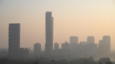 A thick layer of smog envelops buildings at Gurugram-Faridabad road near Bandhwari village earlier in the week. (Parveen Kumar/HT Photo) A thick layer of smog envelops buildings at Gurugram-Faridabad road near Bandhwari village earlier in the week. (Parveen Kumar/HT Photo)