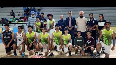 Ludhiana Academy team posing with their trophy after winning the U-14 Sub-junior Punjab Basketball Championship in Ludhiana on Monday. (Manish/Hindustan Times)