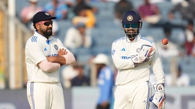 India's captain Rohit Sharma, left, chats with India's Rishabh Pant during second Test against New Zealand. (AP) India's captain Rohit Sharma, left, chats with India's Rishabh Pant during second Test against New Zealand. (AP)